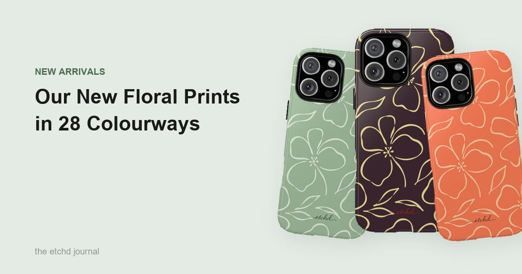 Three etchd floral phone cases in sage, espresso and coral, each with a large hand drawn bloom