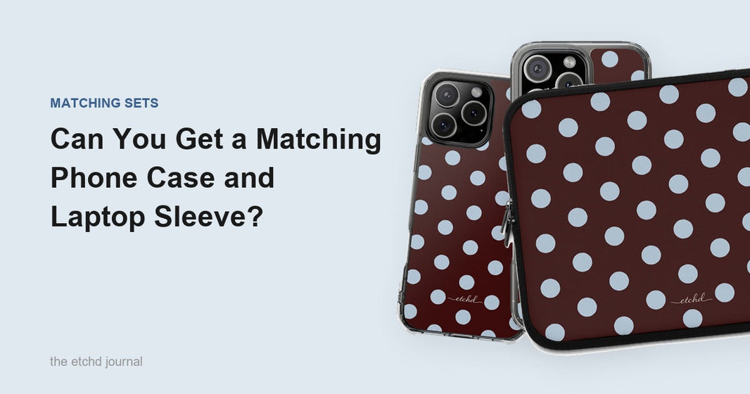 A cherry and blue polka dot laptop sleeve beside two matching phone cases in the same print, by etchd