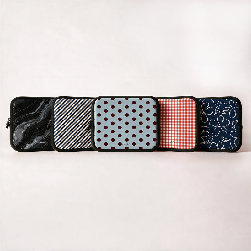 Laptop sleeves by etchd, five designs shown side by side